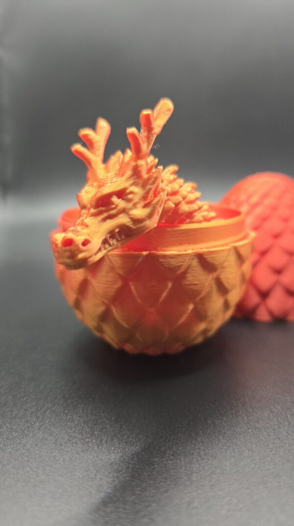 Draak en ei oranje rood
