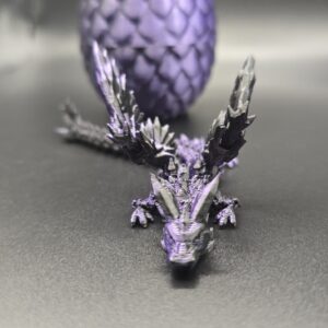 Draak en ei zwart paars