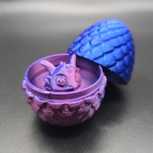 Draakje met ei paars blauw