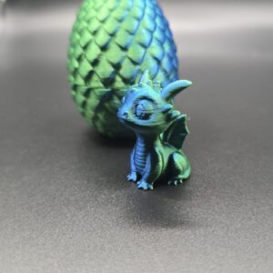 Draakje met ei groen blauw