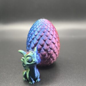Draakje met ei groen, blauw paars
