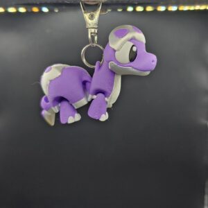 Dino sleutelhanger paars