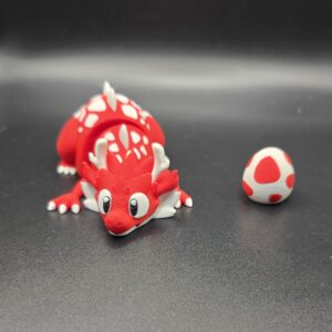 Draak met ei rood